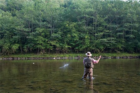 Man Fly Fishing, Cairns Pool, Beaverkill River, Catskill Park, New York, USA Stock Photo - Premium Royalty-Free, Code: 600-01345200