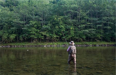 Man Fly Fishing, Cairns Pool, Beaverkill River, Catskill Park, New York, USA Stock Photo - Premium Royalty-Free, Code: 600-01345201
