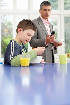 family eating cereal - Father and Son Stock Photo - Premium Royalty-Free, Code: 600-01374066