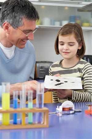 simsearch:700-01345033,k - Father Helping Daughter With Homework Stock Photo - Premium Royalty-Free, Code: 600-01374081