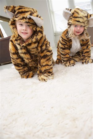 shag carpet - Brother and Sister Wearing Costumes Stock Photo - Premium Royalty-Free, Code: 600-01374147