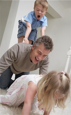 simsearch:600-01717666,k - Father and Children Playing Stock Photo - Premium Royalty-Free, Code: 600-01374156