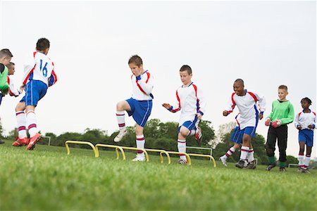Soccer Team Practicing Stock Photo - Premium Royalty-Free, Code: 600-01374796