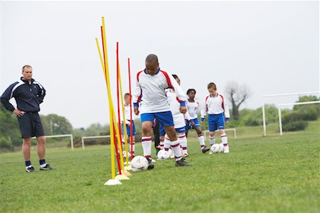 Soccer Team Practicing Stock Photo - Premium Royalty-Free, Code: 600-01374790