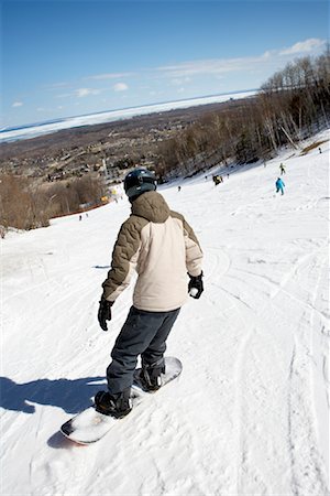 Boy Snowboarding, Blue Mountain, Collingwood, Ontario, Canada Stock Photo - Premium Royalty-Free, Code: 600-01378635