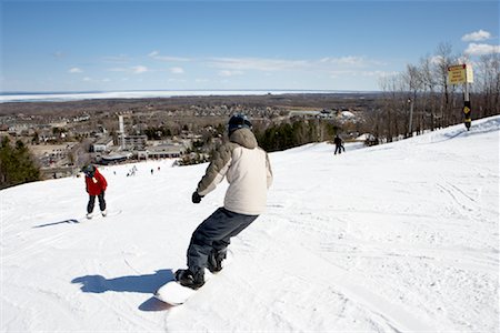 Boy Snowboarding, Blue Mountain, Collingwood, Ontario, Canada Stock Photo - Premium Royalty-Free, Code: 600-01378636