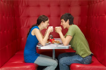 people seating at restaurant - Couple in Restaurant Stock Photo - Premium Royalty-Free, Code: 600-01407146