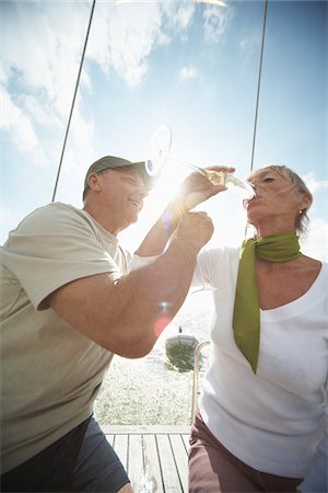 early retirement - Couple Drinking Champagne Stock Photo - Premium Royalty-Free, Code: 600-01464334