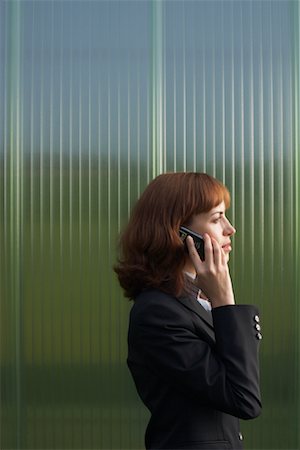 Businesswoman with Cellular Phone Stock Photo - Premium Royalty-Free, Code: 600-01464370