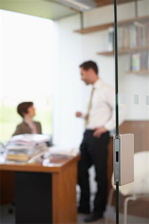 small business door - Man and Woman in Office Stock Photo - Premium Royalty-Free, Code: 600-01464388