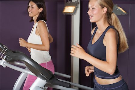 Women Working Out on Treadmills Stock Photo - Premium Royalty-Free, Code: 600-01494726