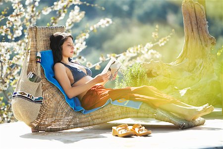 simsearch:600-02010145,k - Woman Relaxing Outdoors Stock Photo - Premium Royalty-Free, Code: 600-01540618