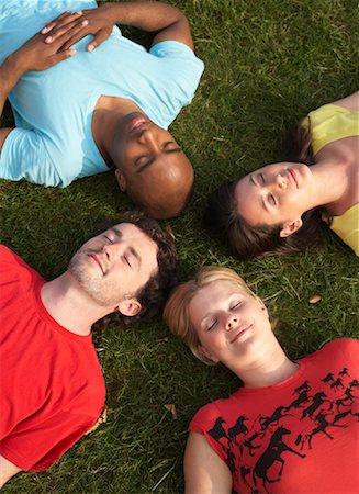simsearch:700-01185080,k - Friends Lying in Grass Stock Photo - Premium Royalty-Free, Code: 600-01540722