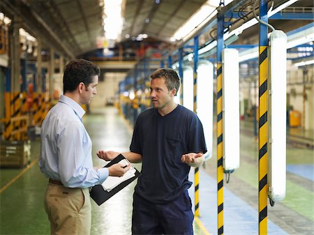 Men Talking in Automotive Plant Stock Photo - Premium Royalty-Free, Code: 600-01575555