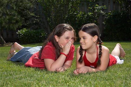 pictures of a little girl whispering - Portrait of Girls Outdoors Stock Photo - Premium Royalty-Free, Code: 600-01571912
