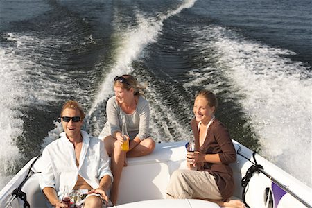 relax cottage lake - Friends on Boat Stock Photo - Premium Royalty-Free, Code: 600-01585706