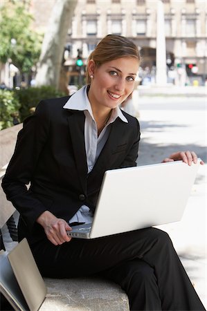 Businesswoman Using Laptop Stock Photo - Premium Royalty-Free, Code: 600-01593608