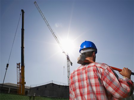 simsearch:600-01593896,k - Construction Worker Holding Sledgehammer Stock Photo - Premium Royalty-Free, Code: 600-01593854