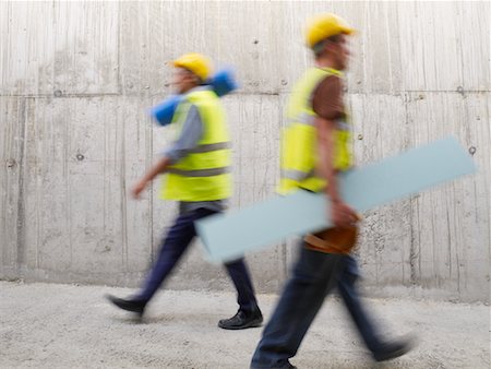Blurred View of Construction Workers Stock Photo - Premium Royalty-Free, Code: 600-01593904
