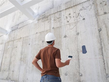 Construction Worker With Paint Stock Photo - Premium Royalty-Free, Code: 600-01593911