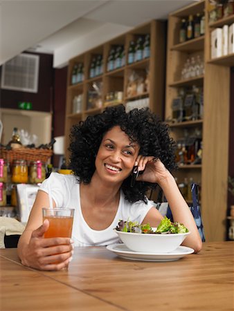 people restaurant lights interior - Woman in Cafe Stock Photo - Premium Royalty-Free, Code: 600-01606717