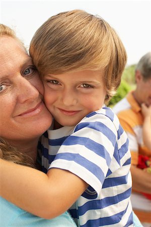 simsearch:632-05816381,k - Mother and Son Hugging Stock Photo - Premium Royalty-Free, Code: 600-01614168