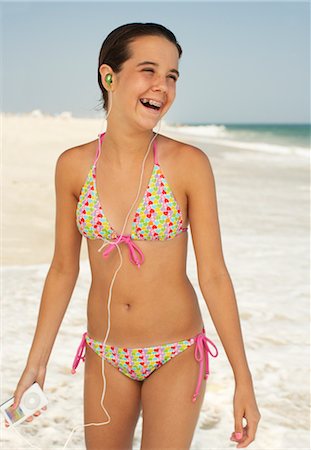 preteen bikini - Girl on Beach With Mp3 Player Stock Photo - Premium Royalty-Free, Code: 600-01614184