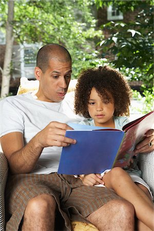 simsearch:600-01614238,k - Father Reading Book with Daughter Stock Photo - Premium Royalty-Free, Code: 600-01614267