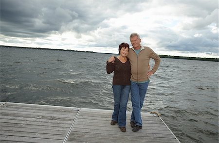 Portrait of Couple on Dock Stock Photo - Premium Royalty-Free, Code: 600-01614810