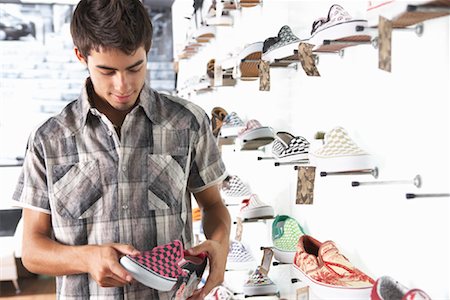 simsearch:693-06013903,k - Young Man in Shoe Store Stock Photo - Premium Royalty-Free, Code: 600-01616503