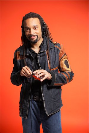 dreadlocks on african americans - Portrait of Man With MP3 Player Stock Photo - Premium Royalty-Free, Code: 600-01613488