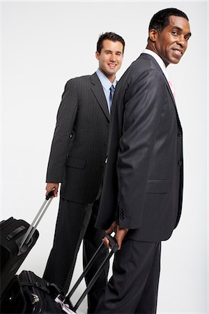 executive standing white background - Businessmen With Suitcases Stock Photo - Premium Royalty-Free, Code: 600-01613713