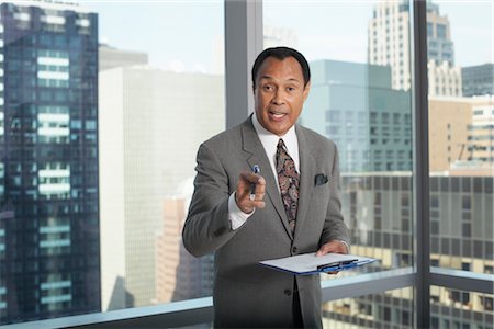 simsearch:600-01613965,k - Businessman with Clipboard Stock Photo - Premium Royalty-Free, Code: 600-01613890