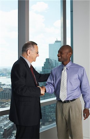 simsearch:600-00177073,k - Businessmen in Office Shaking Hands Stock Photo - Premium Royalty-Free, Code: 600-01613996