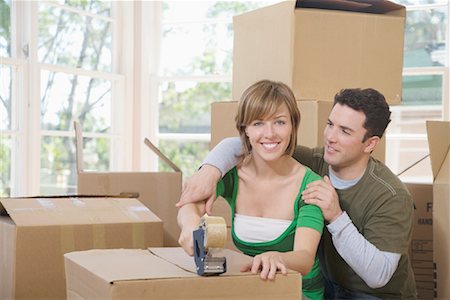simsearch:700-01109929,k - Couple Moving Into New Home Stock Photo - Premium Royalty-Free, Code: 600-01694077