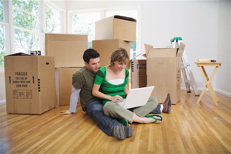 simsearch:700-01109929,k - Couple Moving Into New Home Stock Photo - Premium Royalty-Free, Code: 600-01694086