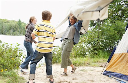 Mother and Children on Campsite Stock Photo - Premium Royalty-Free, Code: 600-01694179