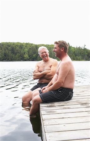 Father and Son on Dock Stock Photo - Premium Royalty-Free, Code: 600-01694228