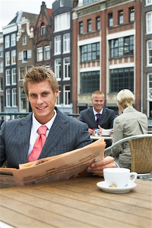 people seating at restaurant - Business People on Cafe Patio, Amsterdam, Netherlands Stock Photo - Premium Royalty-Free, Code: 600-01695100