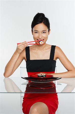 fashion plate - Woman Eating Sushi Stock Photo - Premium Royalty-Free, Code: 600-01695179