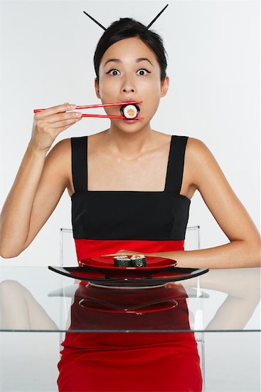 How To Eat With Chopsticks. woman pose chopsticks AND