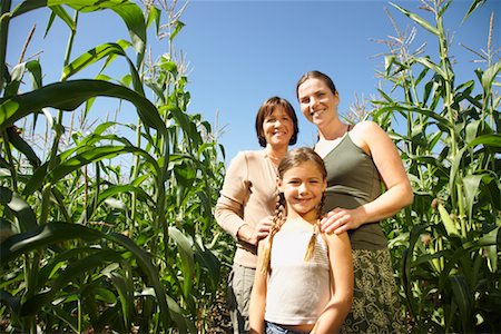 Portrait of Daughter, Mother and Grandmother in Cornfield Stock Photo - Premium Royalty-Free, Code: 600-01715989