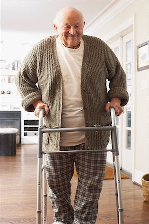 Senior Man Using Walker Stock Photo - Premium Royalty-Free, Code: 600-01716110