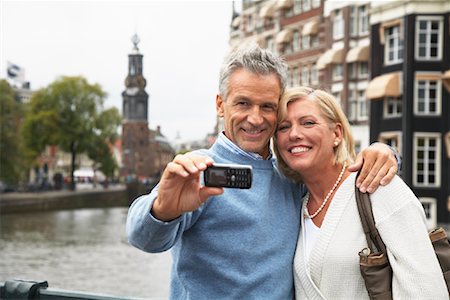 dutch ethnicity - Couple Taking Photo of Themselves Amsterdam, Netherlands Stock Photo - Premium Royalty-Free, Code: 600-01716173