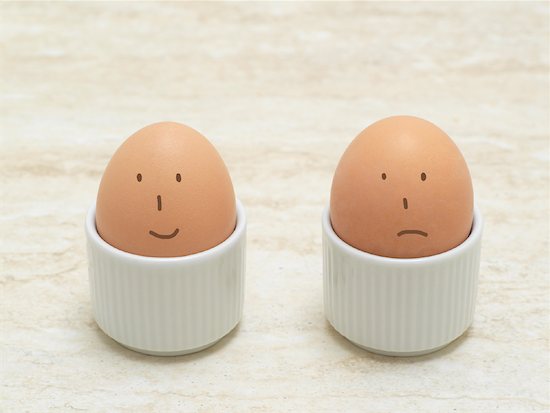 Eggs With Faces. Two Eggs with Drawn-On Faces