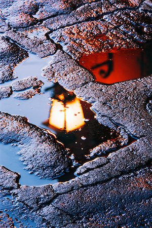puddle in the rain - Reflection in Puddle Stock Photo - Premium Royalty-Free, Code: 600-01717154