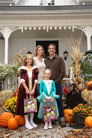 simsearch:693-06435898,k - Portrait of Family Standing in Front of House at Halloween Stock Photo - Premium Royalty-Free, Code: 600-01717687