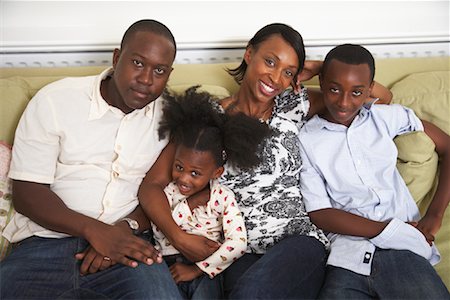 Portrait of Family on Sofa Stock Photo - Premium Royalty-Free, Code: 600-01717939