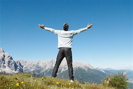 Man Looking over Mountains Stock Photo - Premium Royalty-Free, Code: 600-01742562