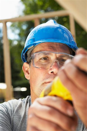 Construction Worker Working Stock Photo - Premium Royalty-Free, Code: 600-01742636